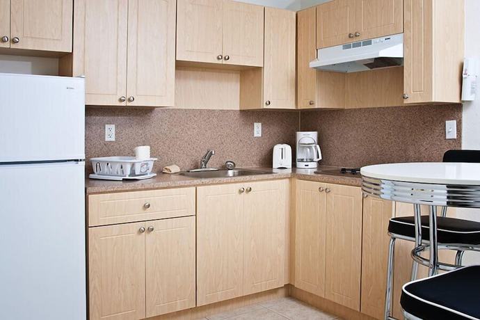 Imagen de la habitación del Hotel South River Suites. Foto 6