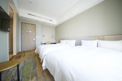Imagen de la habitación del Hotel South Urban. Foto 7
