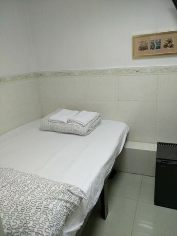 Imagen de la habitación del Hotel South and North House. Foto 16