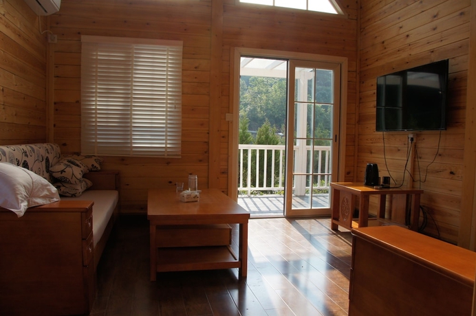 Imagen de la habitación del Hotel Southeastern Flying Tiger Manor. Foto 2