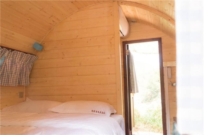 Imagen de la habitación del Hotel Southeastern Flying Tiger Manor. Foto 7