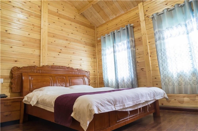 Imagen de la habitación del Hotel Southeastern Flying Tiger Manor. Foto 8