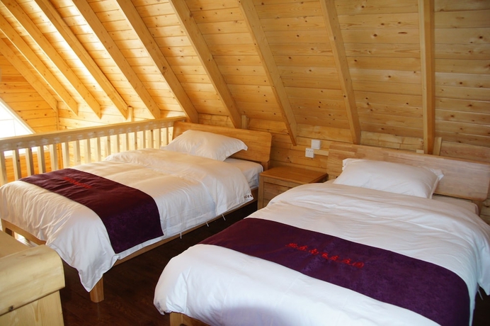 Imagen de la habitación del Hotel Southeastern Flying Tiger Manor. Foto 10