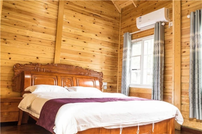 Imagen de la habitación del Hotel Southeastern Flying Tiger Manor. Foto 11