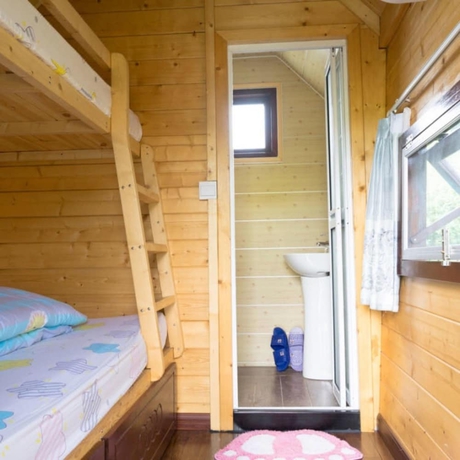 Imagen de la habitación del Hotel Southeastern Flying Tiger Manor. Foto 17