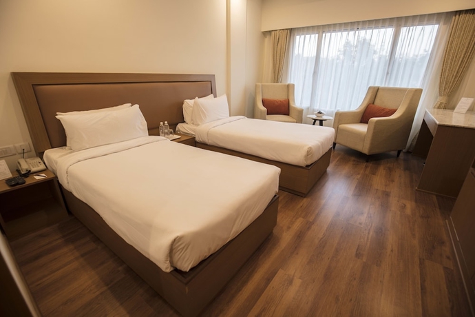 Imagen de la habitación del Hotel Southernstar Bangalore. Foto 5