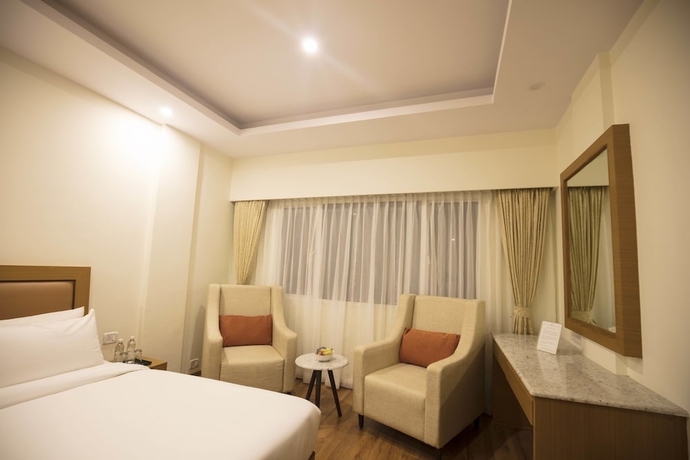 Imagen de la habitación del Hotel Southernstar Bangalore. Foto 7