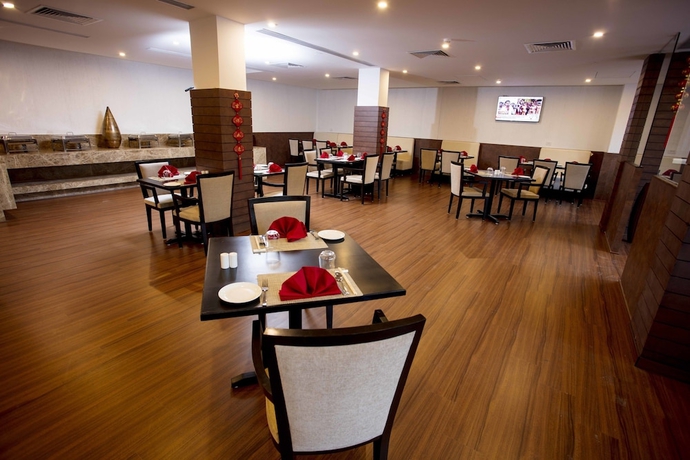 Imagen del bar/restaurante del Hotel Southernstar Bangalore. Foto 3