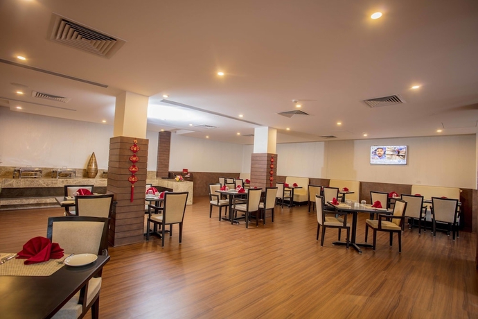 Imagen del bar/restaurante del Hotel Southernstar Bangalore. Foto 4