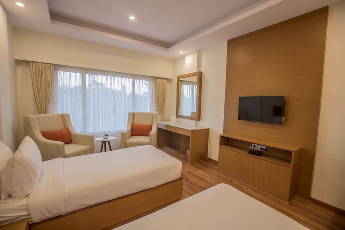 Imagen de la habitación del Hotel Southernstar Bangalore. Foto 11