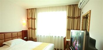 Imagen de la habitación del Hotel Southwest - Urumqi. Foto 11