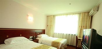 Imagen de la habitación del Hotel Southwest - Urumqi. Foto 12