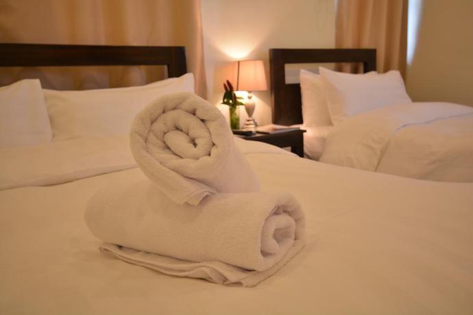 Imagen de la habitación del Hotel Southwind Palawan. Foto 4