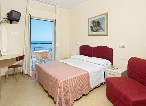 Imagen de la habitación del Hotel Souvenir, Lido di Savio. Foto 4