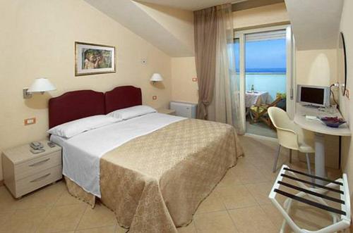 Imagen de la habitación del Hotel Souvenir, Lido di Savio. Foto 8