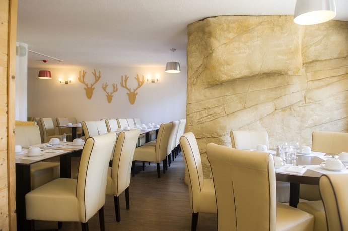 Imagen del bar/restaurante del Hotel Sowell Family Les Bergers, Uvernet-Fours. Foto 4