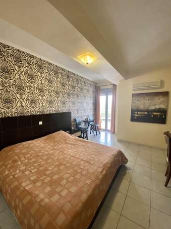 Imagen de la habitación del Hotel Sozos Inn. Foto 17