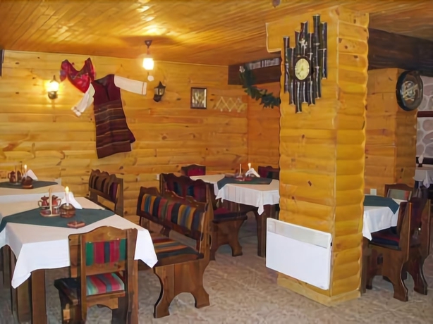 Imagen del bar/restaurante del Hotel Spa And Apartment Mountain Romance. Foto 4