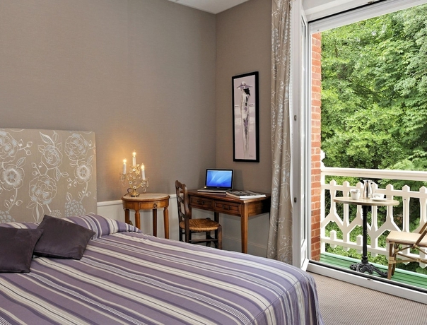 Imagen de la habitación del Hotel Spa Le Roc Au Chien. Foto 7