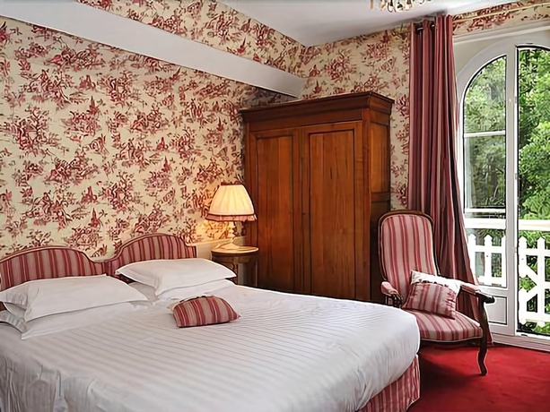 Imagen de la habitación del Hotel Spa Le Roc Au Chien. Foto 11