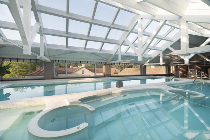 Imagen de la piscina del Hotel Spa Relais and Chateaux A Quinta Da Auga. Foto 20