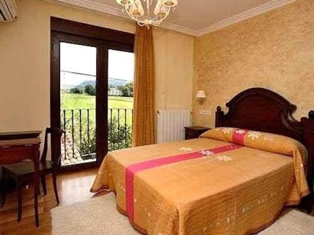 Imagen de la habitación del Hotel Spa Rural Mies De Rubayo. Foto 12