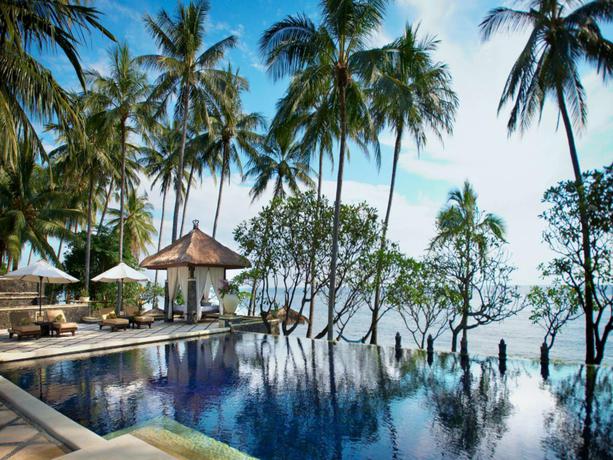 Imagen de la piscina del Hotel Spa Village Resort Tembok Bali. Foto 15