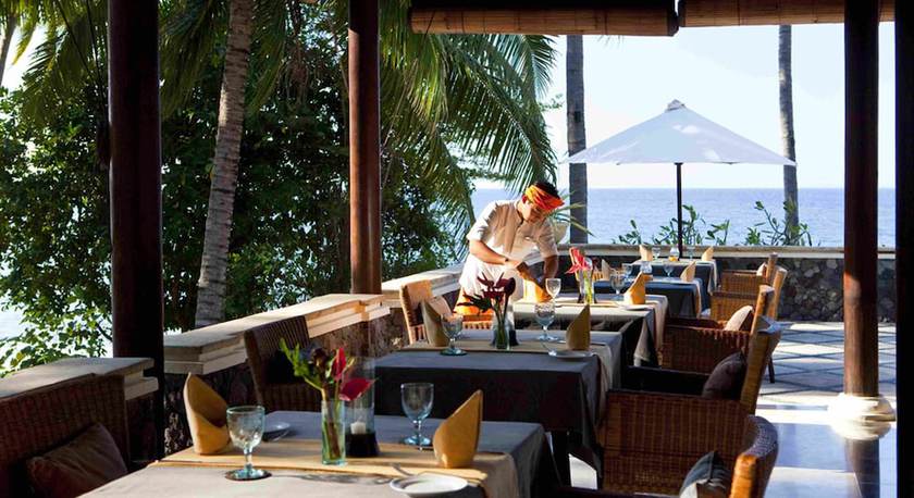 Imagen del bar/restaurante del Hotel Spa Village Resort Tembok Bali. Foto 2