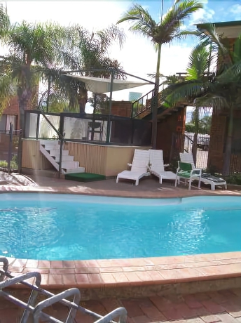 Imagen de la piscina del Hotel Spa Village Travel Inn. Foto 16