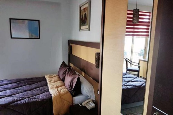 Imagen de la habitación del Hotel Space Telemly. Foto 6