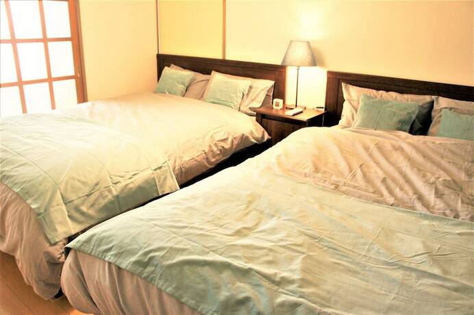 Imagen de la habitación del Hotel Spacious Apartment Sunshine City. Foto 28