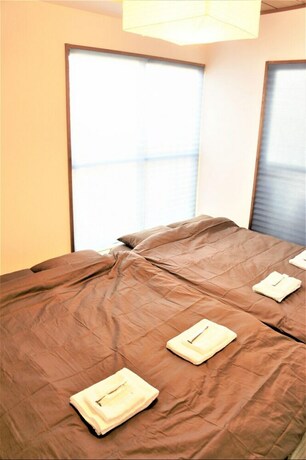 Imagen de la habitación del Hotel Spacious Apartment Sunshine City. Foto 30