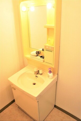 Imagen de la habitación del Hotel Spacious Apartment Sunshine City. Foto 33