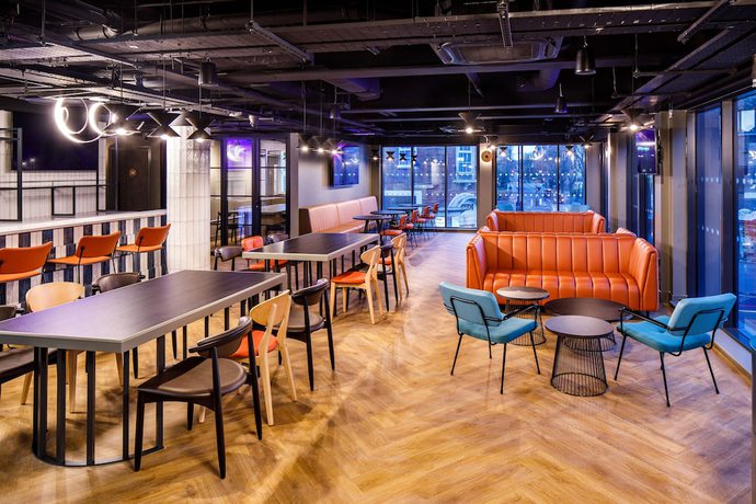 Imagen del bar/restaurante del Hotel Spark by Hilton London Romford. Foto 4