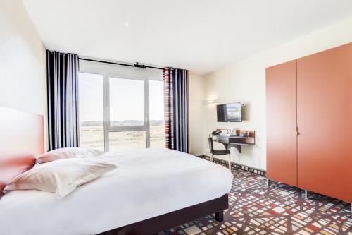 Imagen de la habitación del Hotel Spark by Hilton Lyon Eurexpo. Foto 7