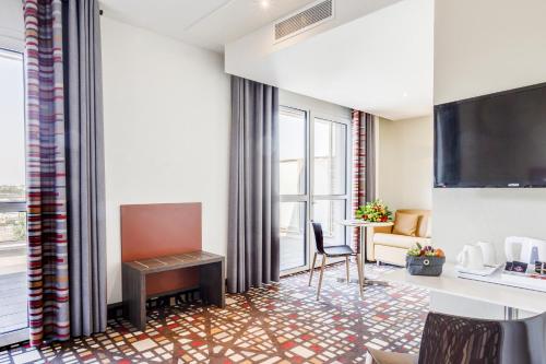 Imagen de la habitación del Hotel Spark by Hilton Lyon Eurexpo. Foto 8