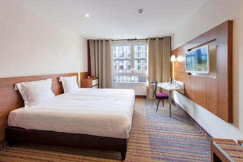 Imagen de la habitación del Hotel Spark by Hilton Lyon Ouest. Foto 3