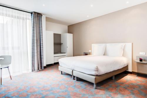 Imagen de la habitación del Hotel Spark by Hilton Lyon Park Saone. Foto 16