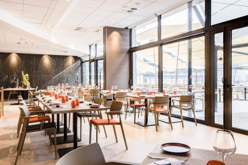 Imagen del bar/restaurante del Hotel Spark by Hilton Lyon Park Saone. Foto 11