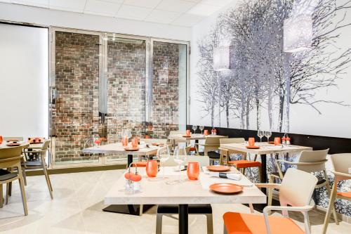 Imagen del bar/restaurante del Hotel Spark by Hilton Lyon Park Saone. Foto 12