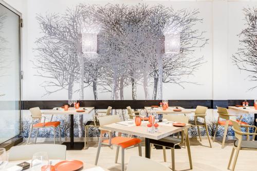 Imagen del bar/restaurante del Hotel Spark by Hilton Lyon Park Saone. Foto 13