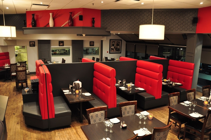 Imagen del bar/restaurante del Hotel Spark by Hilton Montreal Brossard. Foto 3