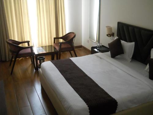 Imagen de la habitación del Hotel Sparkle, Zirakpur. Foto 20