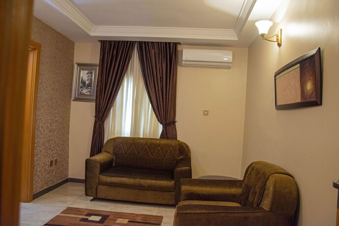 Imagen de la habitación del Hotel Sparklyns And Suites. Foto 9