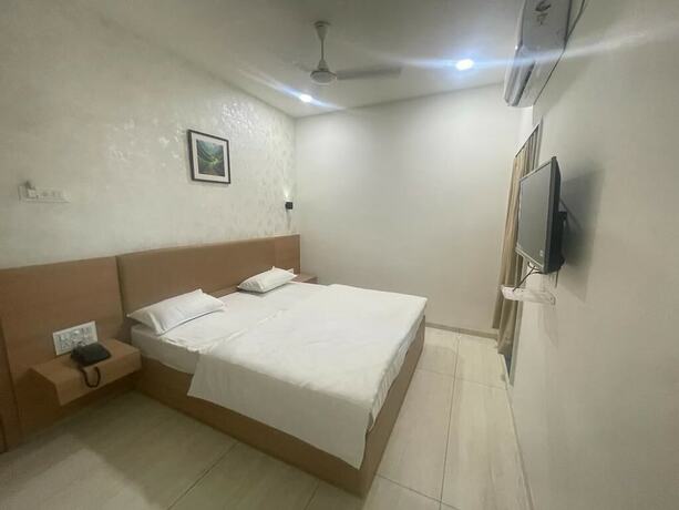 Imagen de la habitación del Hotel Sparsh Inn Morbi. Foto 5