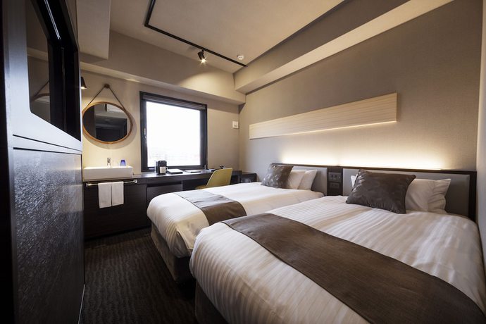 Imagen de la habitación del Hotel S-peria Hakata. Foto 2