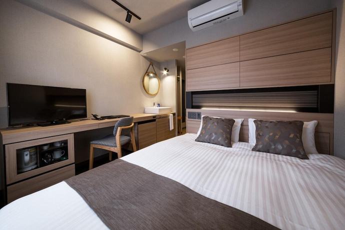 Imagen de la habitación del Hotel S-peria Hakata. Foto 3