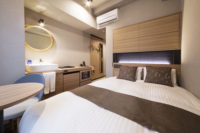 Imagen de la habitación del Hotel S-peria Hakata. Foto 8