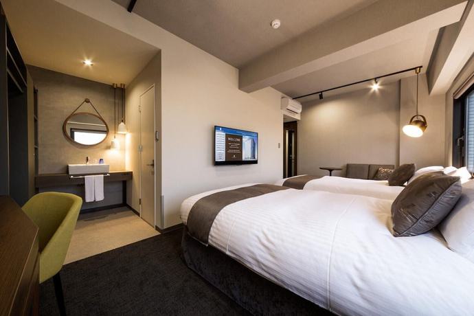 Imagen de la habitación del Hotel S-peria Hakata. Foto 11