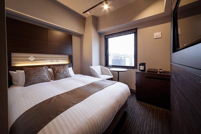 Imagen de la habitación del Hotel S-peria Hakata. Foto 12